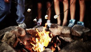 Enjoy roasting marshmallows and connecting with family around the campfire after a long day of resort cottage fun & activities